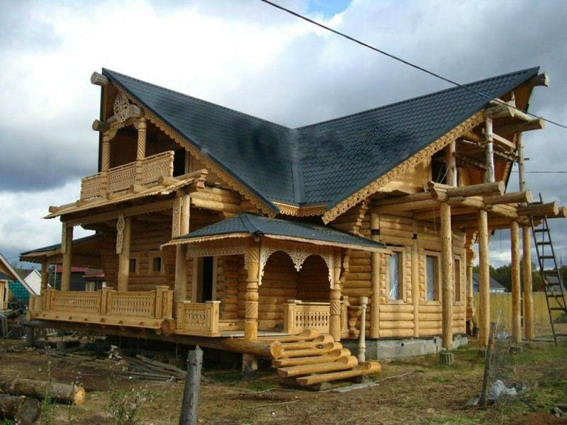 резное крыльцо деревянного дома фото